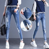 Vintage High Waisted Ripped Jeans